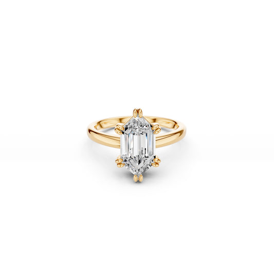 Modern hexagon-cut lab diamond engagement ring with prominent double claw setting, in yellow gold