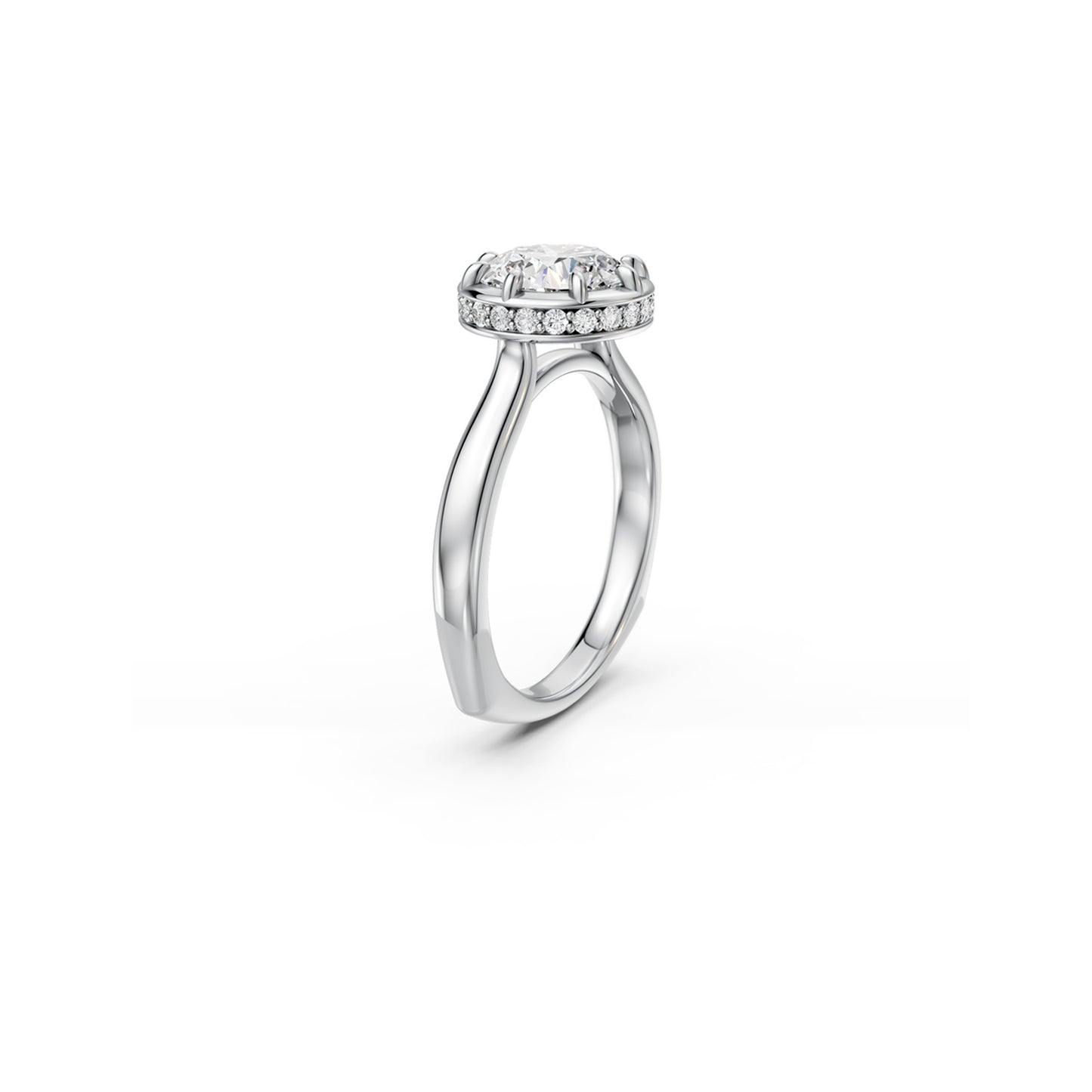 White gold round diamond solitaire ring with hidden halo and euro shank viewed at an angle