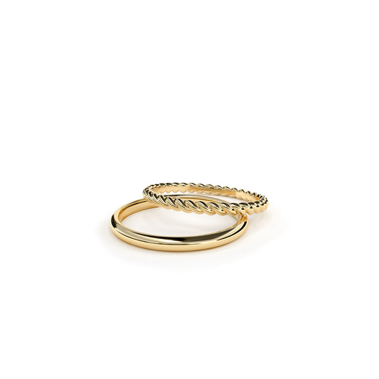 The Twisted Sister stack ring and the Plump Half-round band in 9k yellow gold