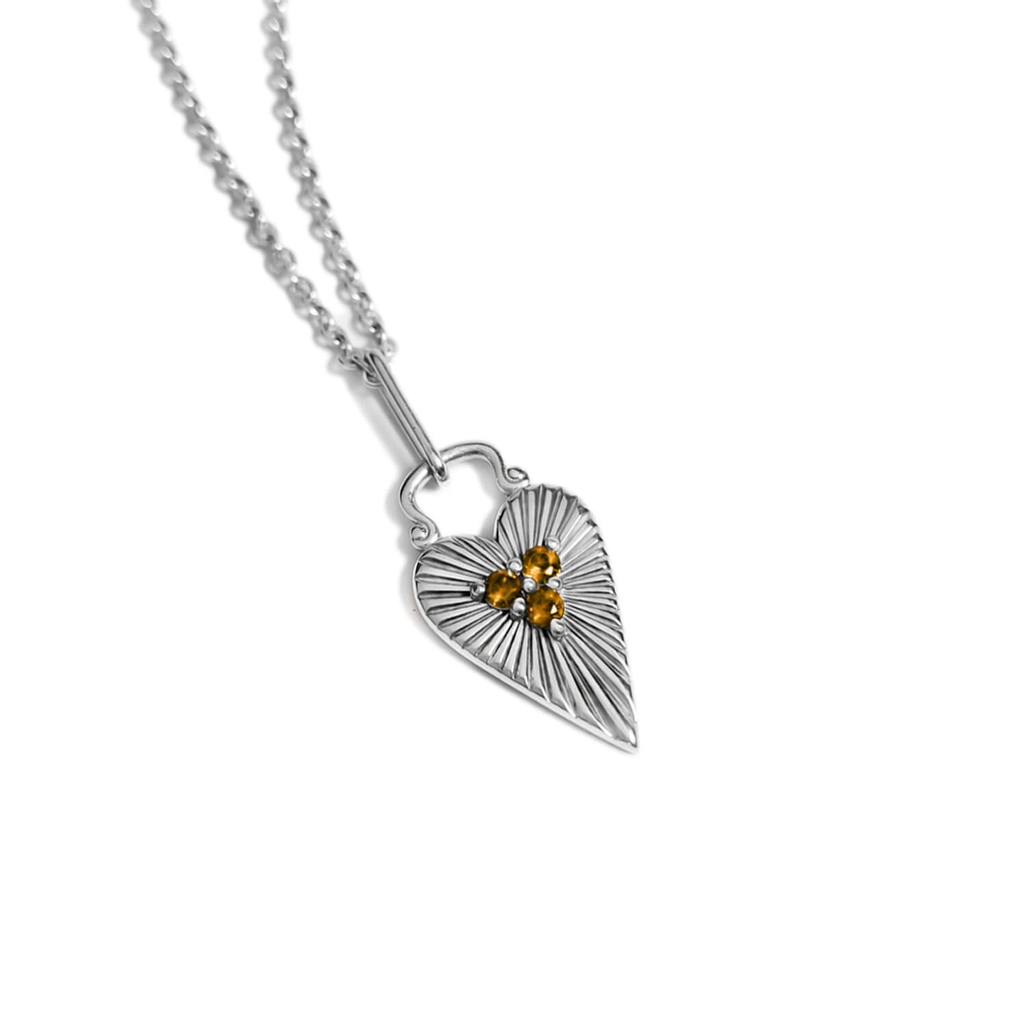 Silver Sunburst Heart pendant set with citrine on a rolo chain