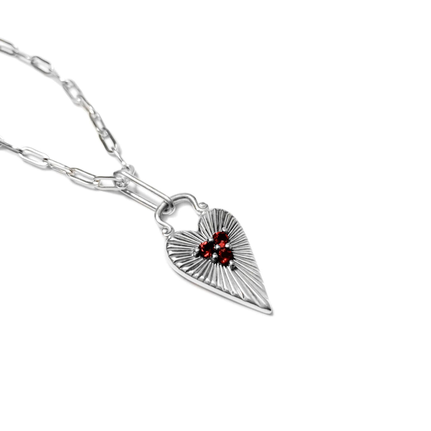 Silver Sunburst Heart pendant set with three garnets on a skinny paperclip chain