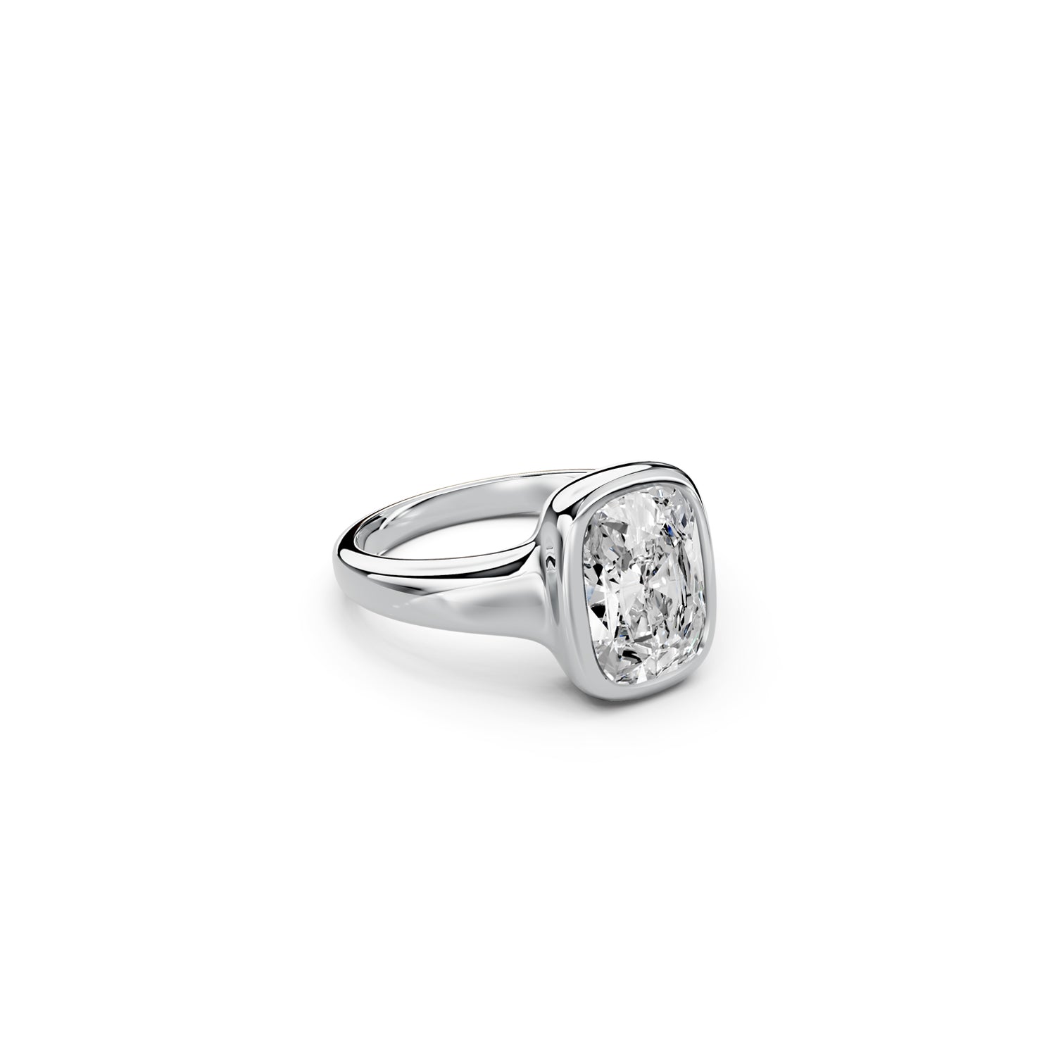 Side view of chunky elongated cushion-cut bezel ring in white gold