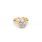 Elongated cushion-cut diamond ring with bold gold bezel, angled view 