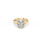 Bezel set elongated cushion-cut ring with puffy gold silhouette in yellow gold
