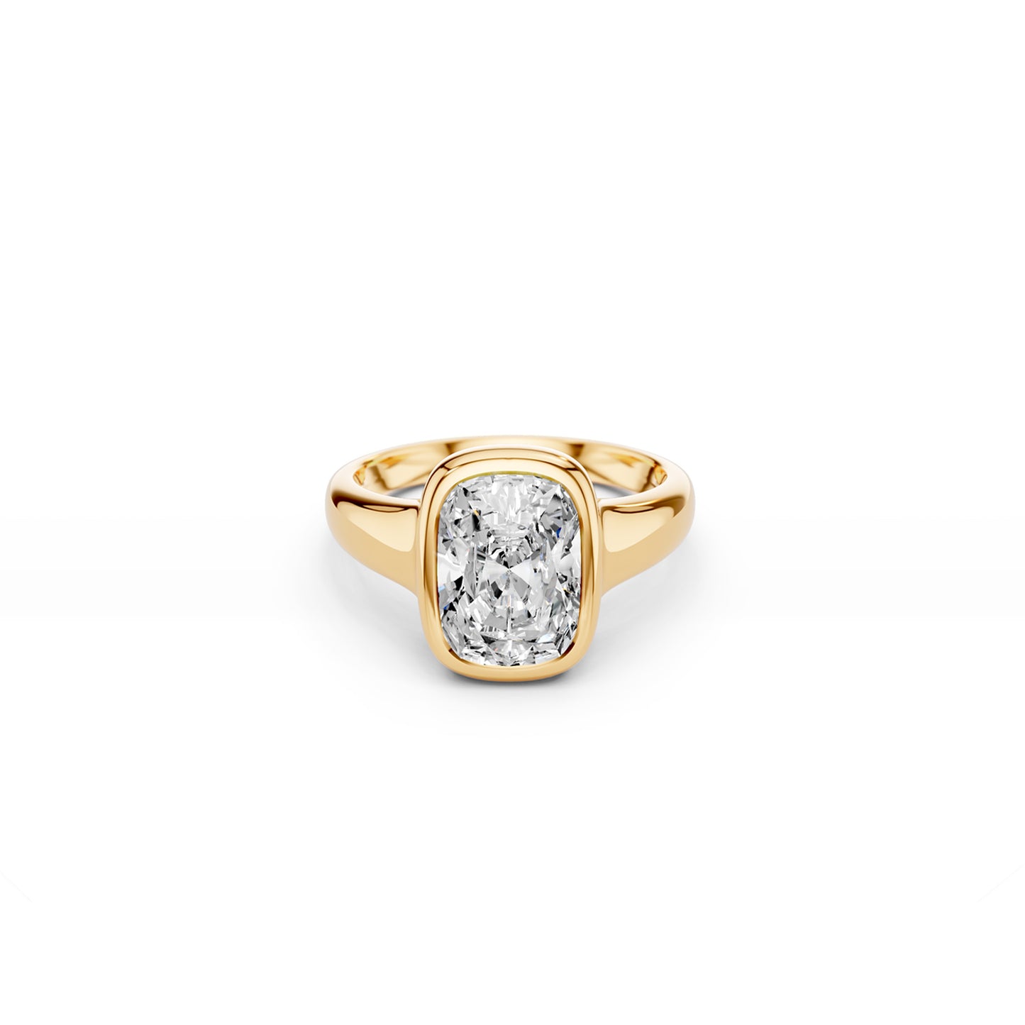 Bezel set elongated cushion-cut ring with puffy gold silhouette in yellow gold