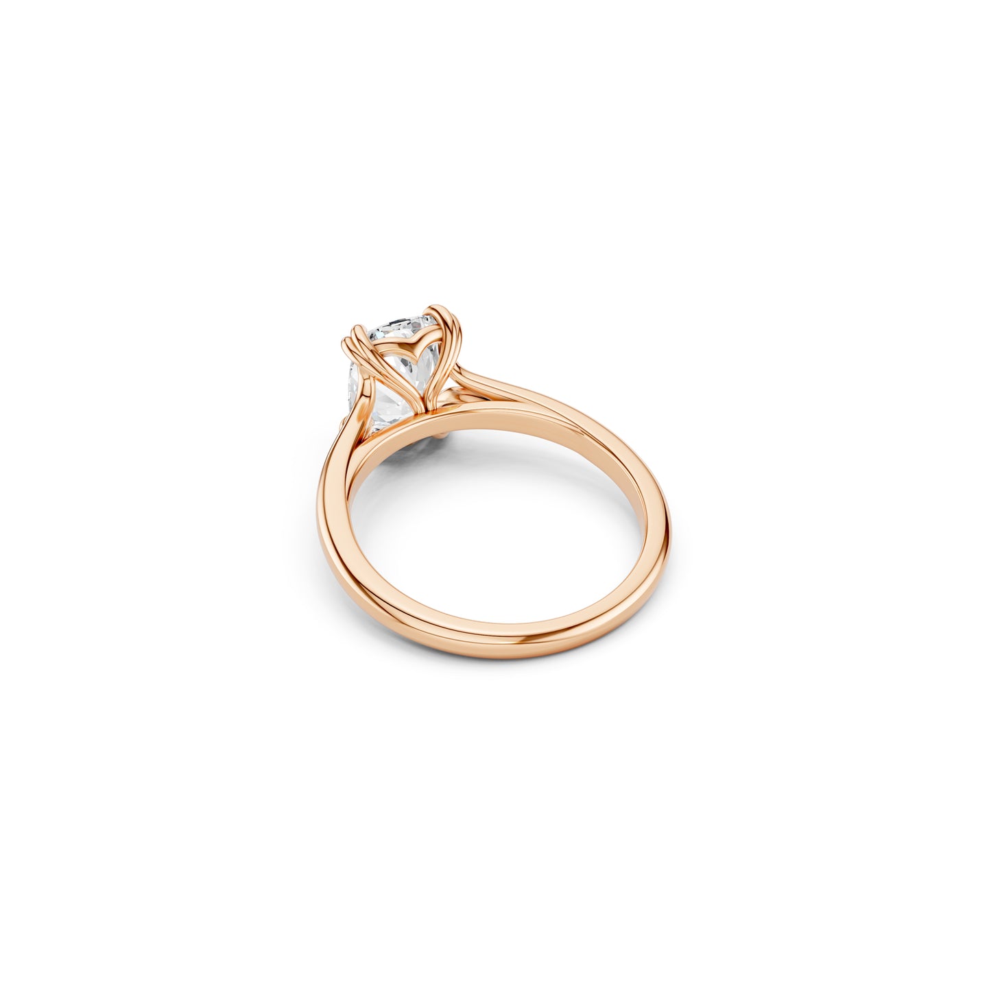 Perspective side view of cushion cut diamond ring with bold double claws and hidden heart detail in rose gold