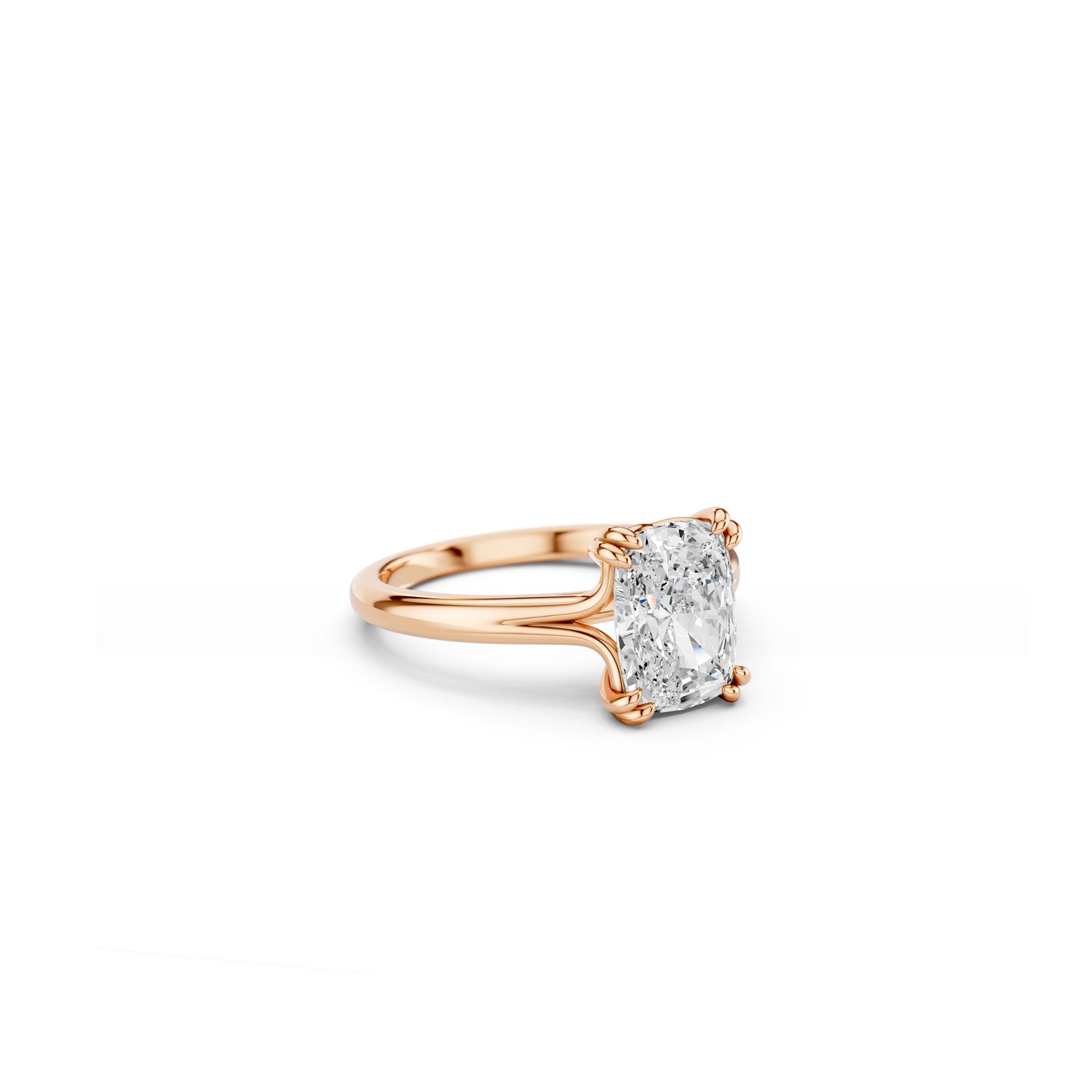 Rose gold elongated cushion diamond ring with bold double claws and split band 