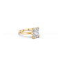 Cushion-cut solitaire engagement ring with double claws and split band in yellow gold