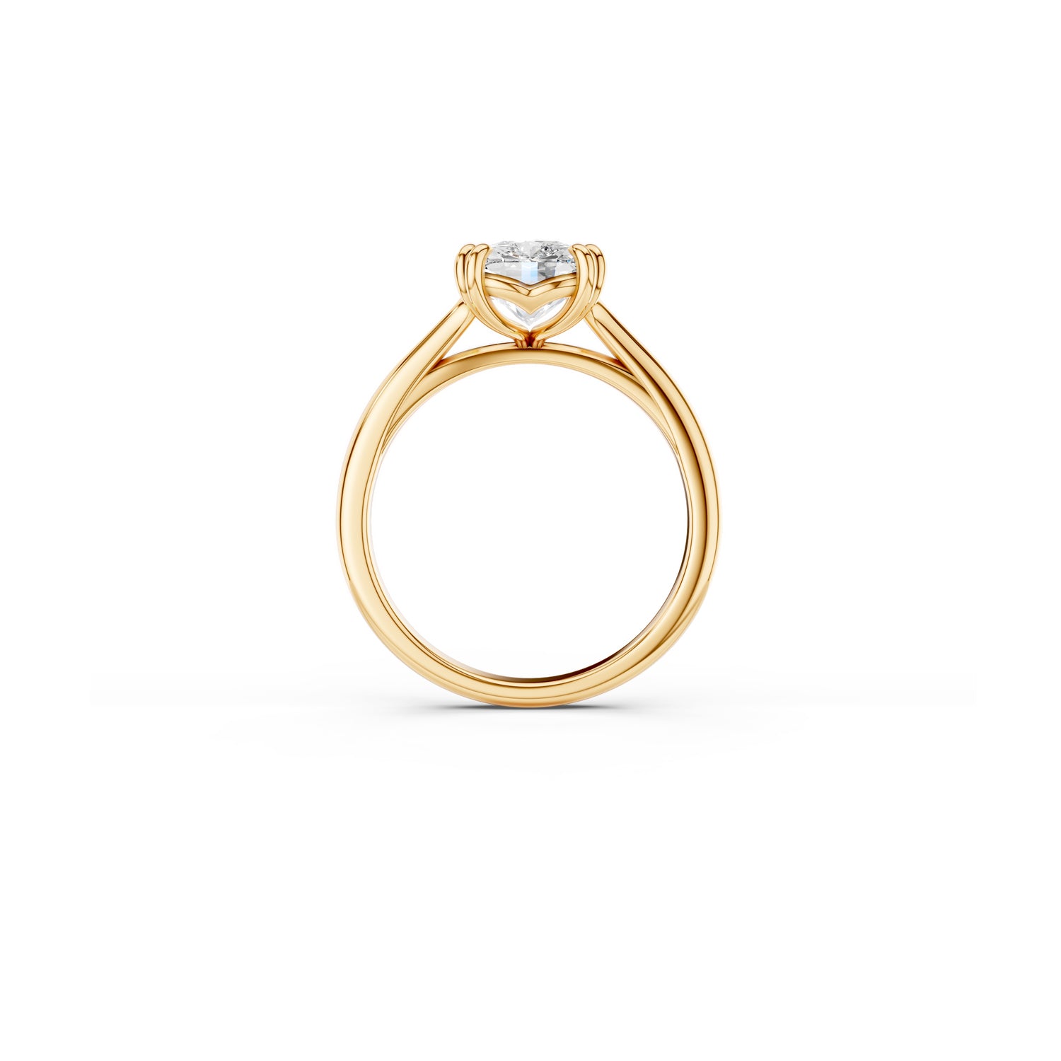 Side view of cushion-cut engagement ring with hidden heart detail in yellow gold 