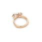 Angled side view showing crossover detail and elevated marquise setting in rose gold