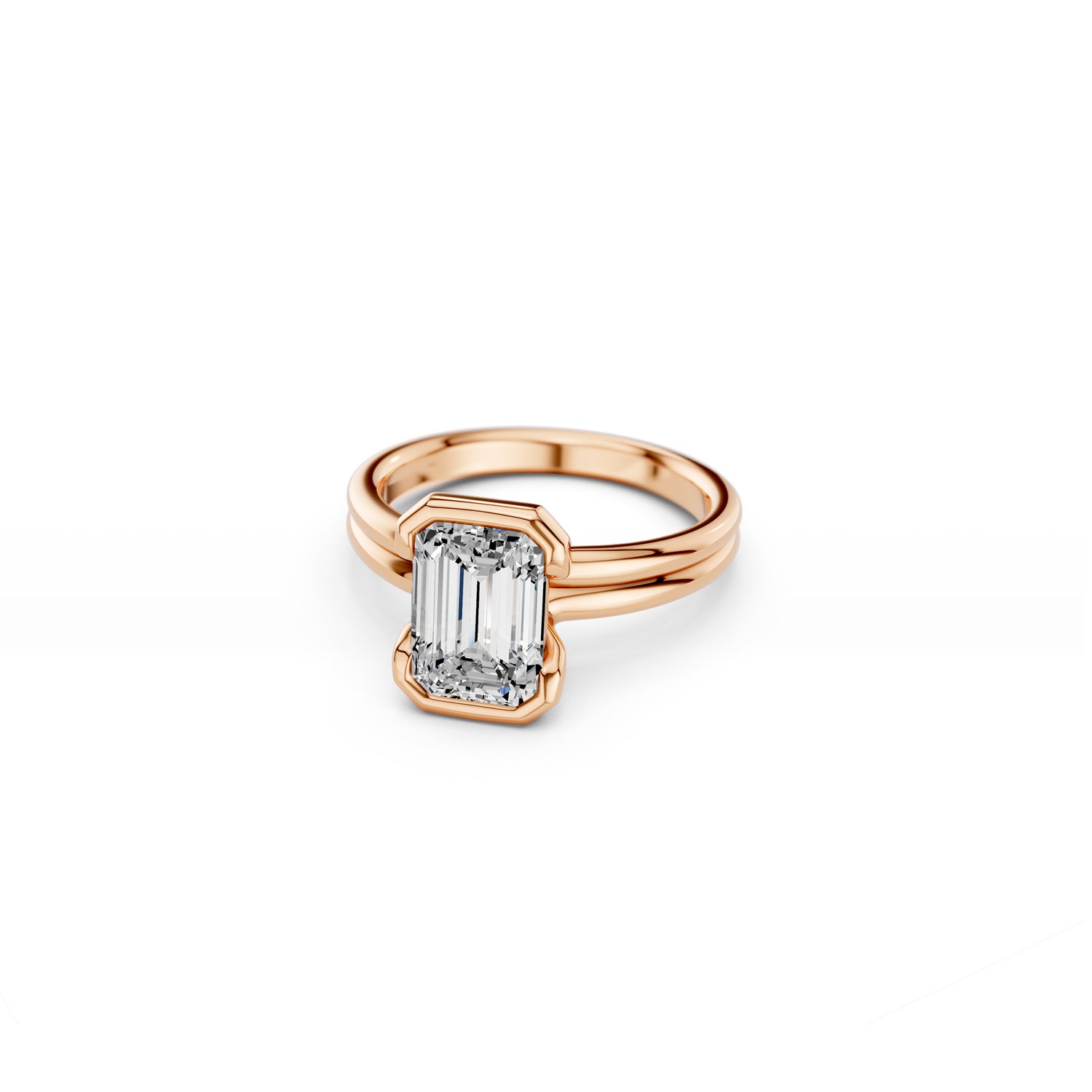Rose gold emerald-cut diamond engagement ring with split bezel setting and double band made in South Africa