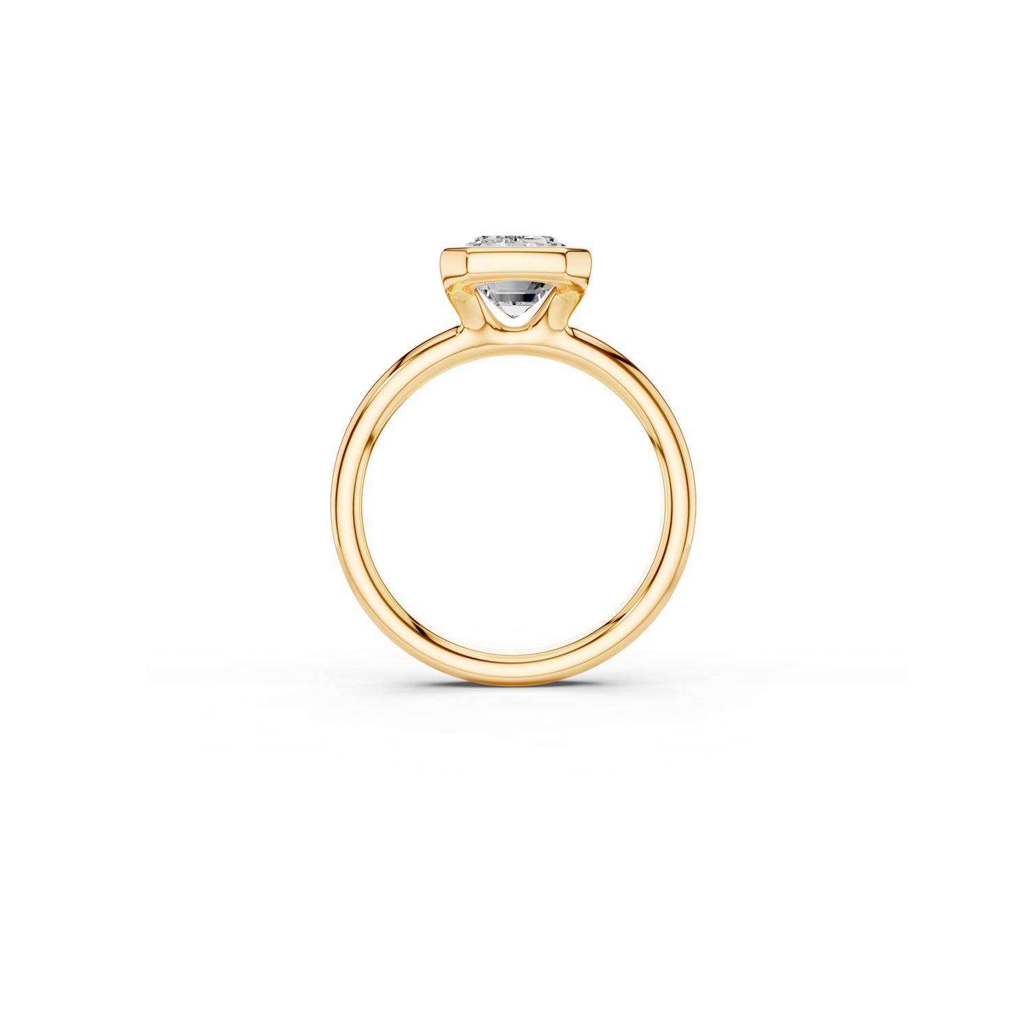 Side view of partial bezel engagement ring in yellow gold