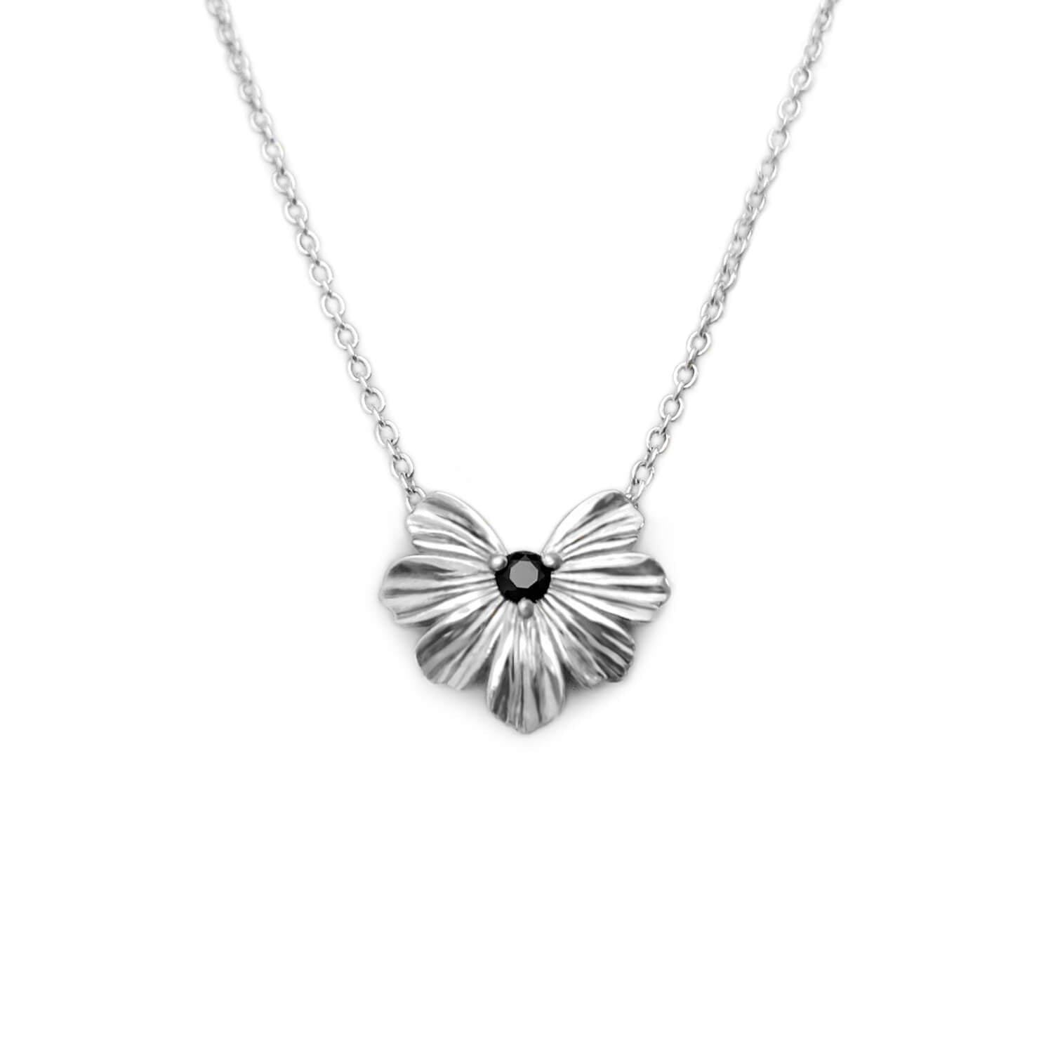 Silver floral heart shaped pendant with black moissanite on a rolo chain 