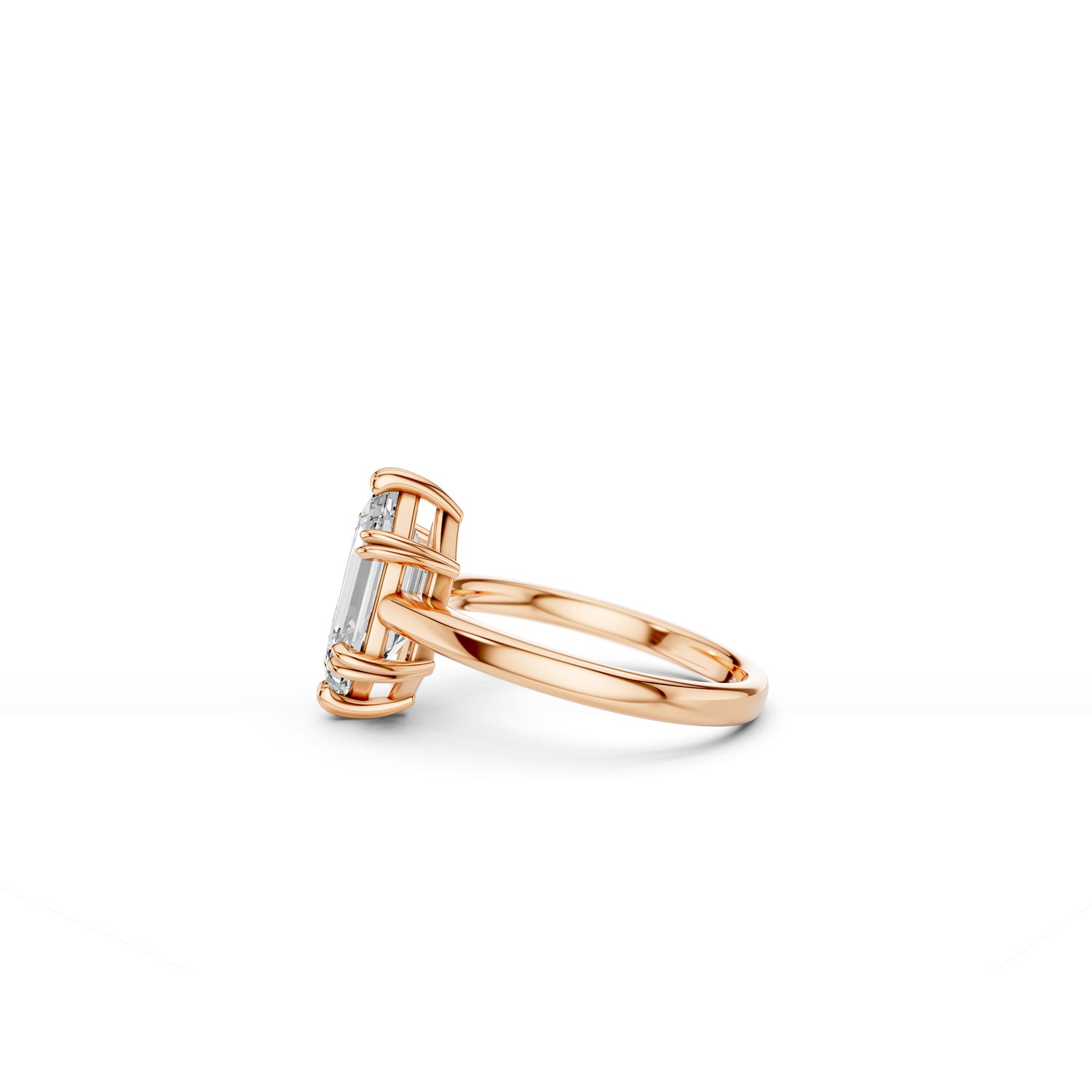 Side view of hexagon step-cut solitaire engagement ring in rose gold