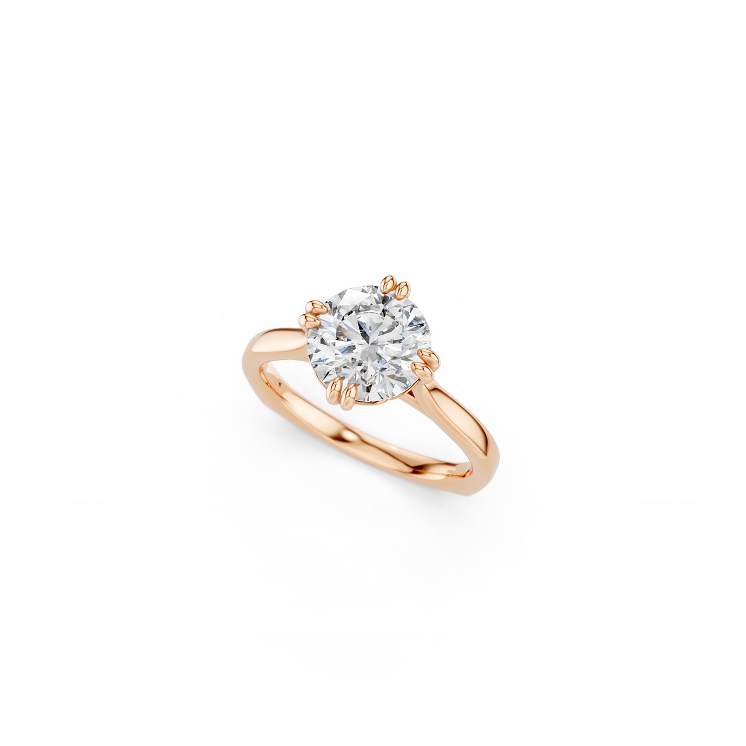 Perspective view of round brilliant cut diamond solitaire with double compass set claws in rose gold 