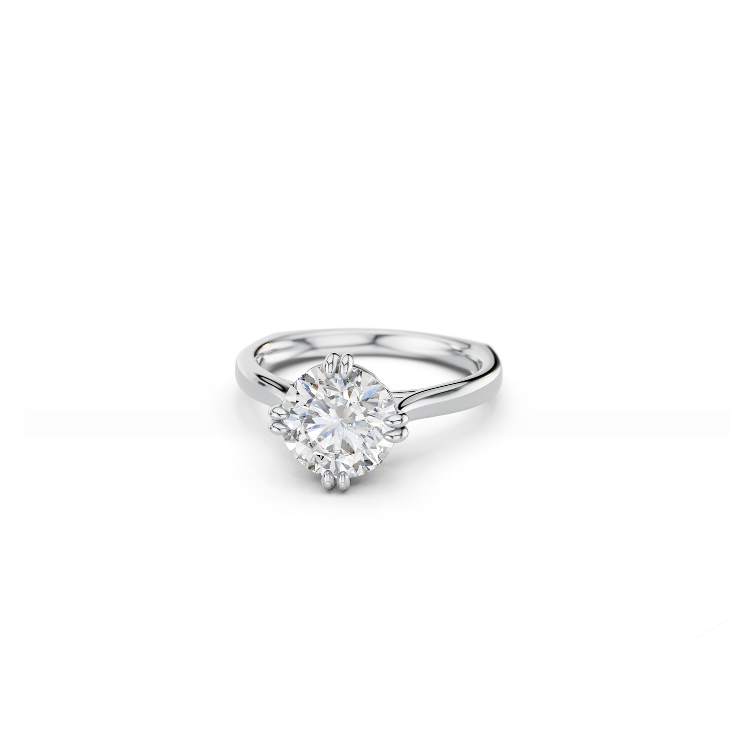 Classic round brilliant cut diamond solitaire with double claws in platinum 