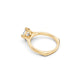 Perspective side view of round brilliant cut diamond solitaire showing hidden heart detail below the diamond and euro shank in yellow gold