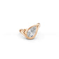 Rose gold wave engagement ring with angled 2ct pear-shaped diamond