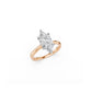 Feminine, two tone marquise solitaire ring in white and rose gold, perspective top view 