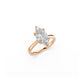 Perspective top view of a marquise diamond solitaire engagement ring in rose gold