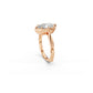 Rose gold Georgian-inspired moval-cut diamond ring with knife edge band viewed from the side 
