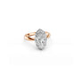 Angled view of two tone moval-cut diamond engagement ring with Georgian-inspired setting