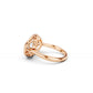 Angled close-up of east-west moval lab diamond ring with decorative side detailing in rose gold | South Africa 