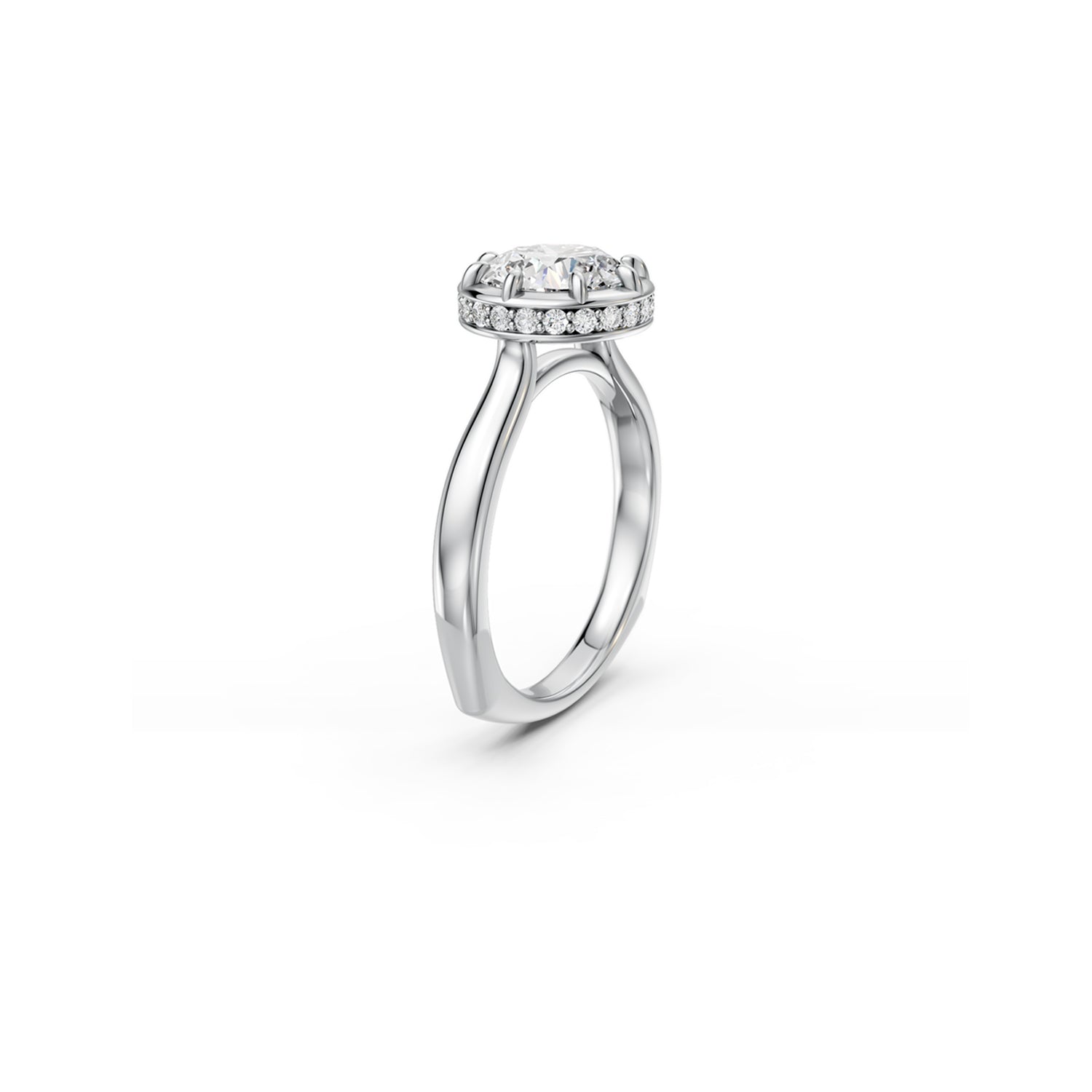 White gold round diamond solitaire ring with hidden halo and euro shank viewed at an angle