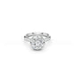 Round brilliant-cut engagement ring with crown-like setting and hidden halo in white gold 