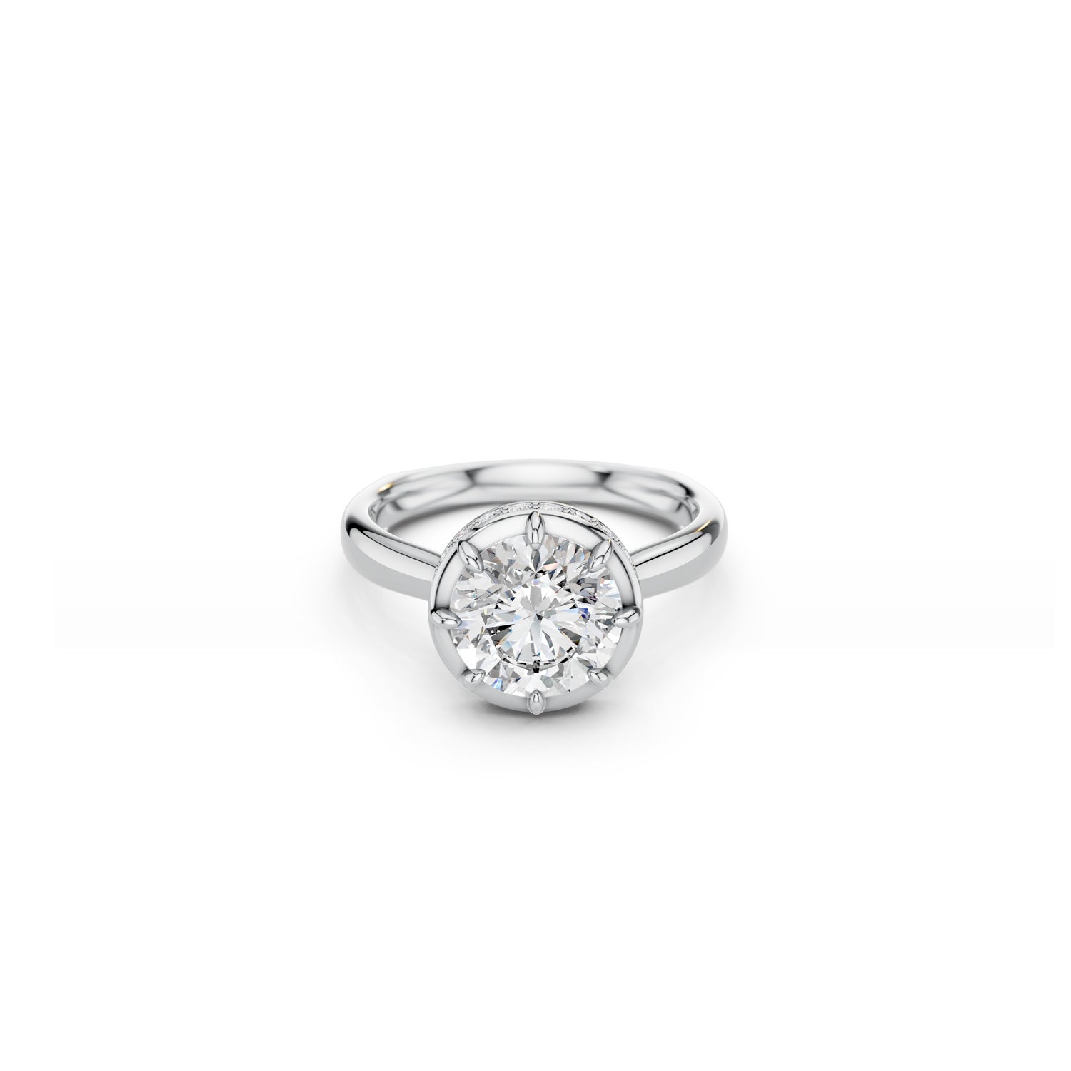 Round brilliant-cut engagement ring with crown-like setting and hidden halo in white gold 