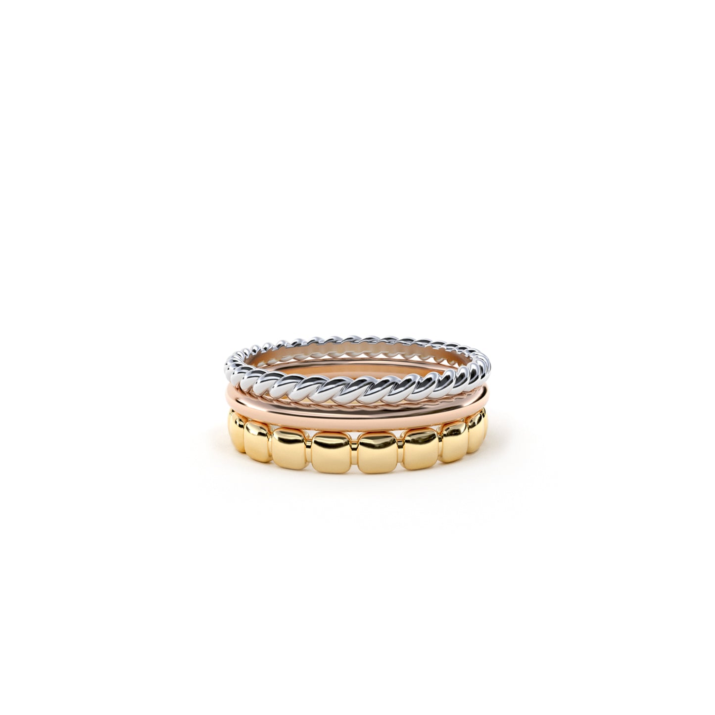 Ring stack with 9k rose and white gold stack rings paired with a Squared Away ring