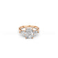Rose gold three-stone ring with cushion-cut centre diamond and pear sides