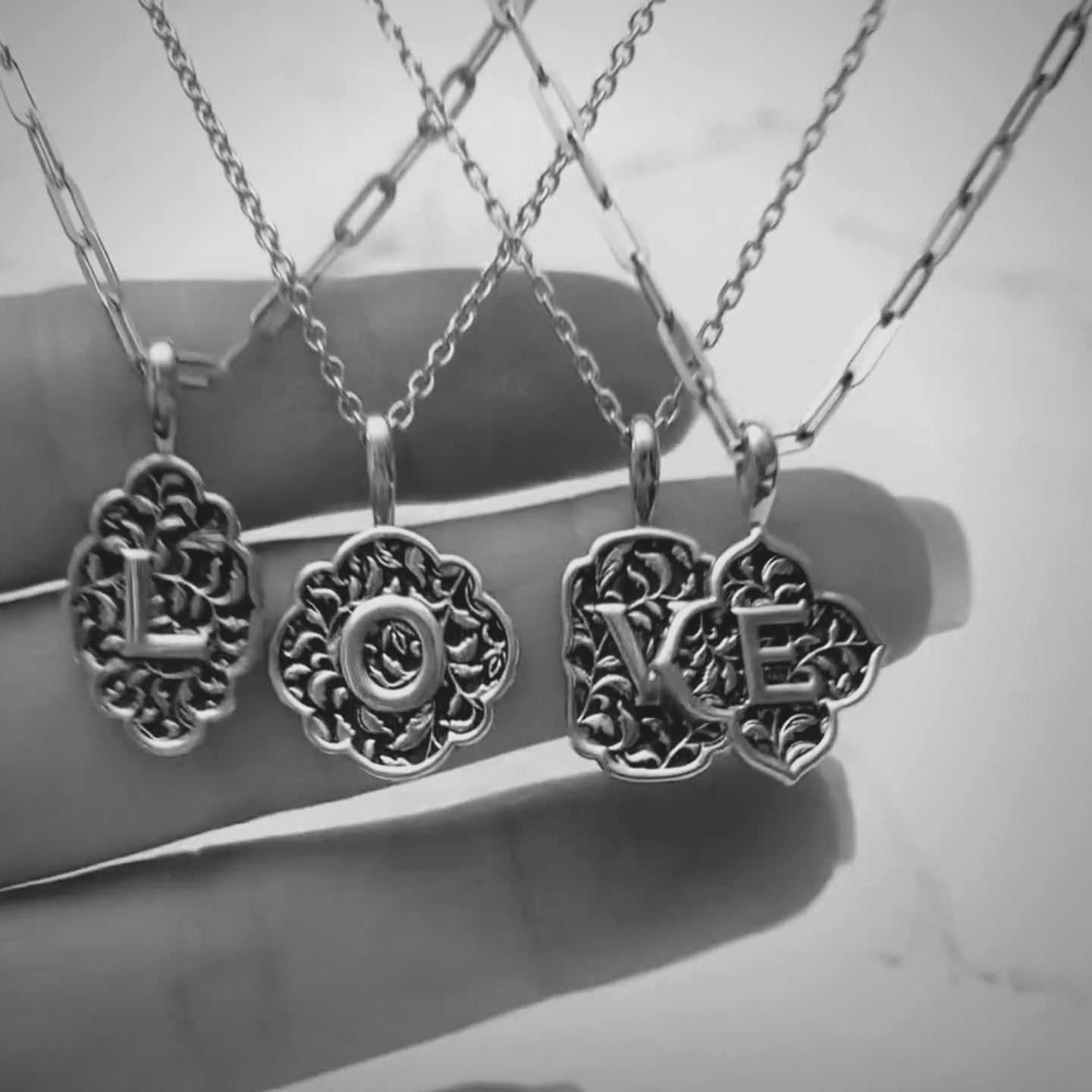 Video featuring all four love letter pendant  shapes in silver